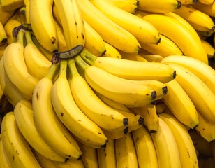 Close-up showcases a heap of vibrant yellow bananas, densely packed together
