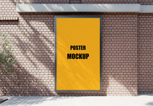 Vertical Poster Mockup on Brick Wall with Sunlight