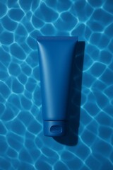Refreshing ocean-blue matte tube lit with water ripple reflections, perfect for skincare, cosmetic branding, and clean aquatic product visuals.
