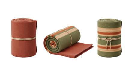 Rolled up blankets in different colors isolated on transparent background for home decor