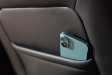 The phone is in the car.