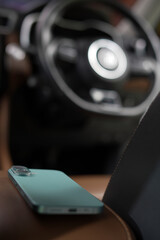 The phone is in the car.