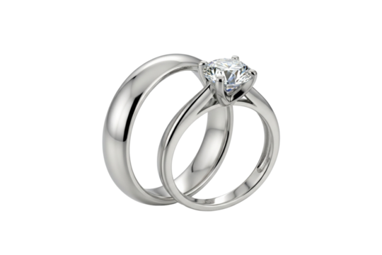 A beautiful wedding ring set with a brilliant solitaire diamond engagement ring and a classic band - Powered by Adobe
