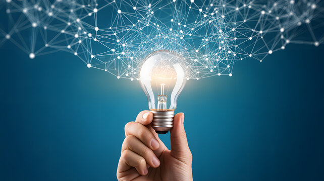 Innovative idea concept with glowing lightbulb held by hand and network above