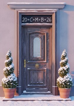 House blessing chalk inscription 20+c+m+b+26 above door with two snowy potted trees.