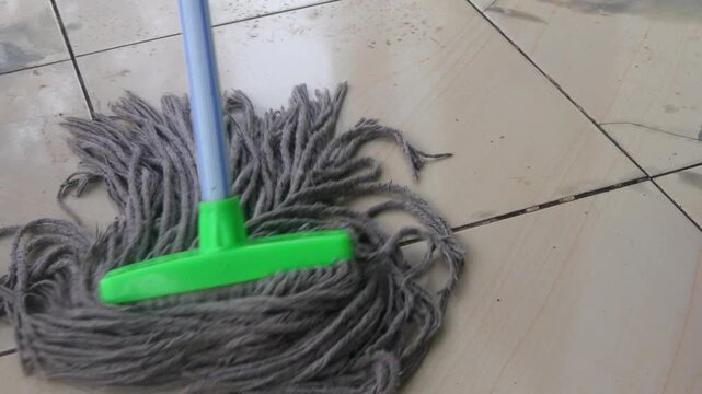 the process of mopping a dirty floor