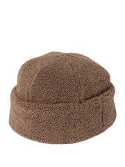 Warm knitted winter cap on a plain white backdrop for woman