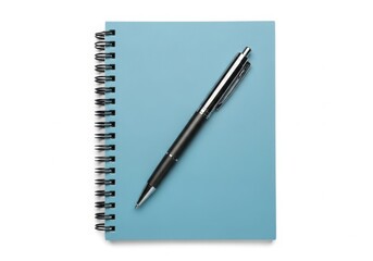 Naklejka premium Light blue spiral notebook and silver pen on white background