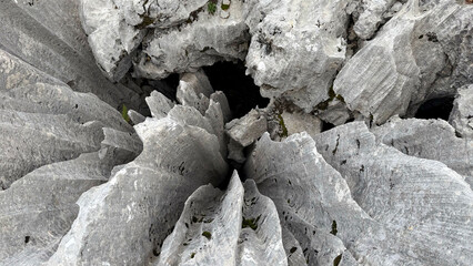 Karst sharp and razor-sharp rock formations in the mountains