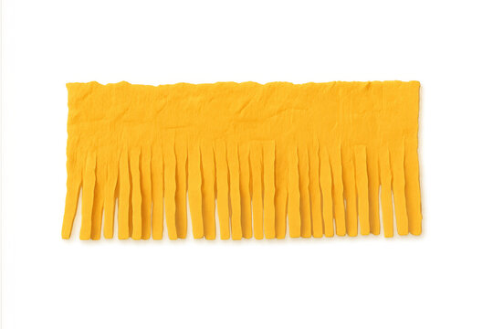 Yellow fringed fabric border isolated on transparent background, soft textile material for crafts and home decor