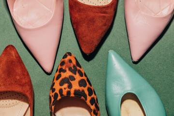 Vintage 1940s heels top view green background