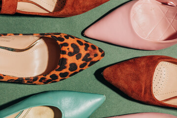 Vintage 1940s heels top view green background