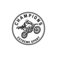 This logo features a motocross rider performing an extreme stunt, capturing the spirit of speed, power, and adrenaline. The dynamic illustration, combined with bold wing-like stripes, creates a strong