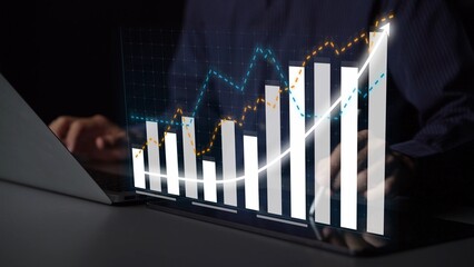 A modern businessman analyzes financial data on a digital screen, showcasing graphs and charts that represent growth and market trends in a professional office setting. Copula