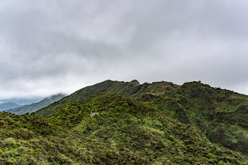 Cabin at top of Poamoho Trail, Honolulu, Windward Coast Oahu, Hawaii. Koʻolau Range ( shield volcano ). Stratocumulus cloud	