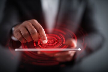 Man in suit interacts with digital tablet displaying net zero target in a professional environment