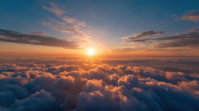 Bright sunrise over fluffy clouds in the sky captured in a timelapse revealing the beauty of morning light and colors