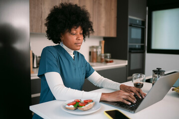 Nurse working from home doing telehealth consultation