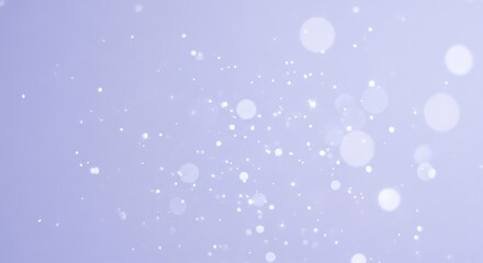 White and purple bokeh lights on a purple background.