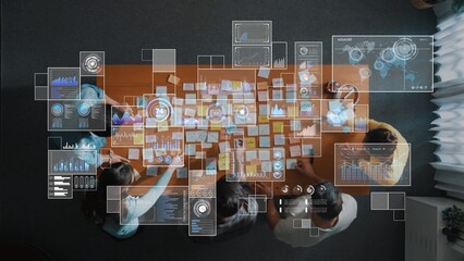 A business team collaborates in a modern office, analyzing data through insights presented in graphs and charts, fostering innovative strategies for success. Raster