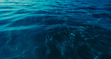 Deep blue ocean water texture. Dark sea waves background as nature and environmental design element
