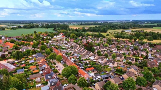 Green districts of low-rise housing. Low-rise Dutch residential areas immersed in dense green vegetation.