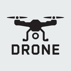 A black drone icon on a white background