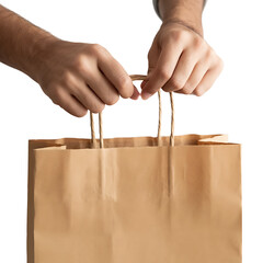 Hands holding the handles of a brown paper shopping bag isolated on transparent background