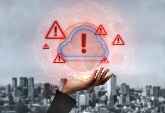 Red alert triangles over a blue cloud icon, symbolizing cloud security threats, system warnings, and data protection risks in digital environments Parse