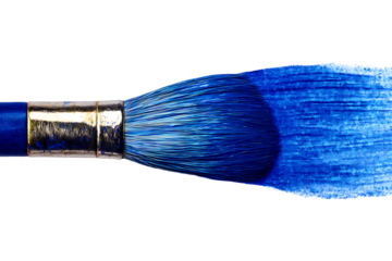 Paint brush applying blue color stroke on transparent surface artistic tool object