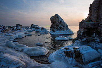 Abandoned military fortifications on a frosty winter evening near Liepaja, Latvia.