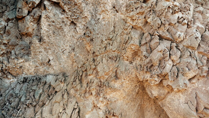 Rock and stone texture brown material background pattern. High resolution seamless rock diffuse texture. textured concrete. Abstract brown rock background. Close-up mountain texture. Seamless pattern
