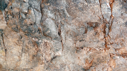 Rock and stone texture brown material background pattern. High resolution seamless rock diffuse texture. textured concrete. Abstract brown rock background. Close-up mountain texture. Seamless pattern