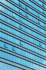 Fototapeta premium Architecture details Glass wall Modern building exterior Abstract futuristic background