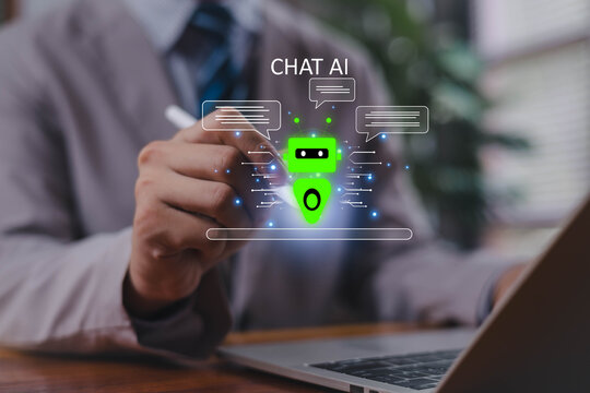 Professional hand interacting with glowing chatbot AI interface on laptop, illustrating modern artificial intelligence, digital communication, machine learning technology, and innovative virtual.