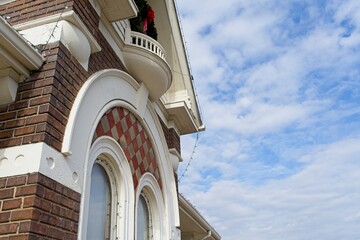 Ornate Brick Building Architecture Against a Blue Sky