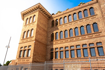 Centre de Formació Marie Curie, a historical brick building (Pavelló B of the former Hospital de l'Esperit Sant) with traditional Catalan architecture, Santa Coloma de Gramanet, Spain