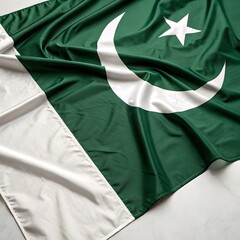 Pakistan's national flag displayed in a flat lay
