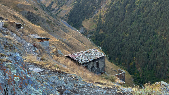 Remote Mountain Hut and Tiny Caf&eacute; on Steep Forested Valley Slope in Georgia