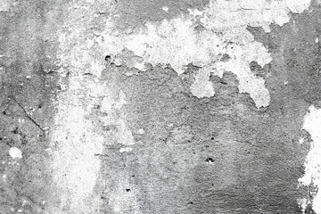 Texture of a concrete wall with cracks and scratches which can be used as a background