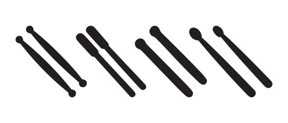 Various drumsticks and mallets for percussion musical instruments.