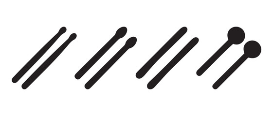 Various drumsticks and mallets for percussion musical instruments.