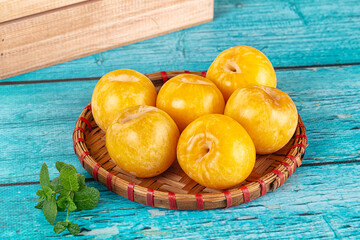 Raw ripe sweet yellow plums