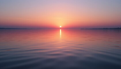 Tranquil Sunset Over Calm Water Reflecting Soft Pastel Colors