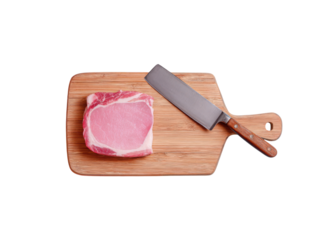 A piece of meat is on a cutting board with a knife next to it