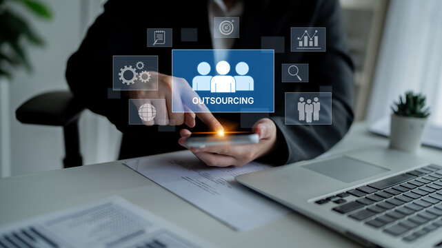 Outsourcing concept showing collaboration, delegation, global workforce, productivity, and task management through remote teams and external service providers Latch