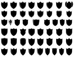 Collection of black shield silhouettes, various shapes and designs, arranged in a grid