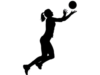 A woman is jumping in the air to catch a volleyball