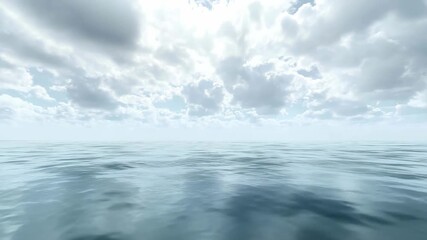 A vast expanse of calm ocean reflects a tranquil sky with scattered clouds. The scene captures the peacefulness of midday by the coast, where water meets sky seamlessly.