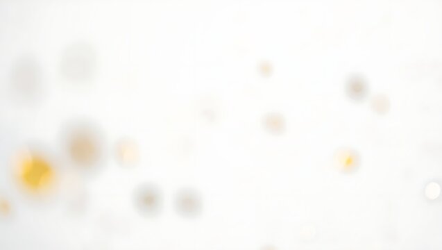 Abstract blurred background with soft golden and white circular bokeh lights